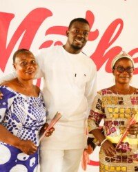 Mothers with flowers from Oyarifa Mall at the Mother's Day event